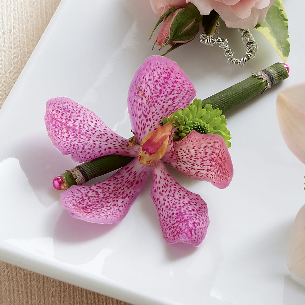 Pink Mokara Boutonniere – Althoff Floral, Cannon Falls MN